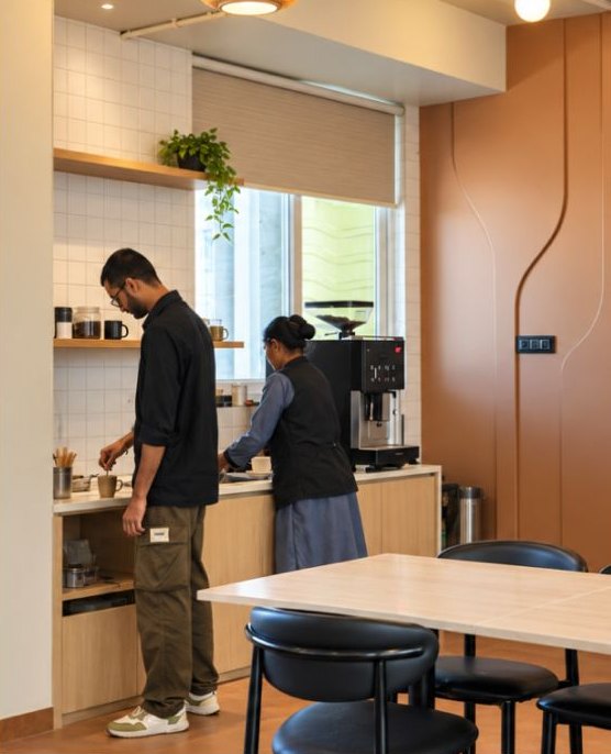 Coffee being made at the café counter